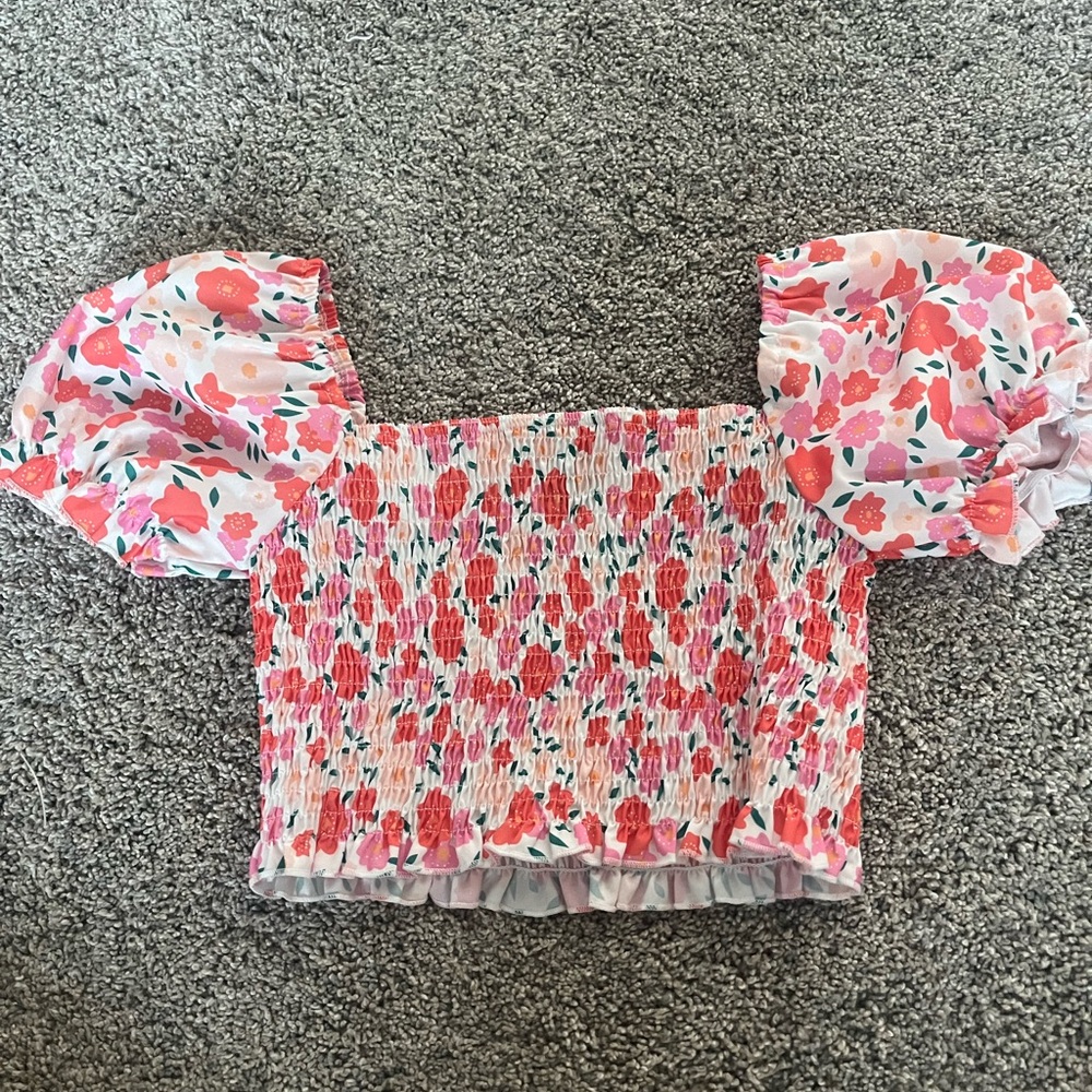 Pink floral stretch top with puffy shoulders